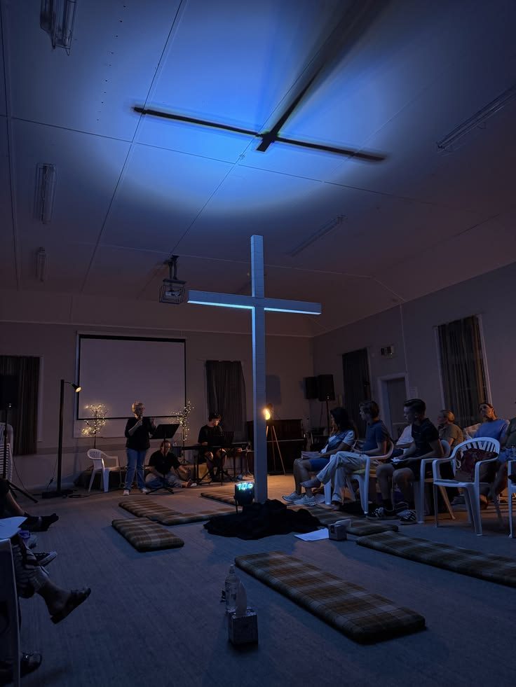 A design talk in progress in a darkened room